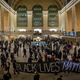 Demonstrators carry a banner through Grand Central Station during a protest against police violence towards minorities.